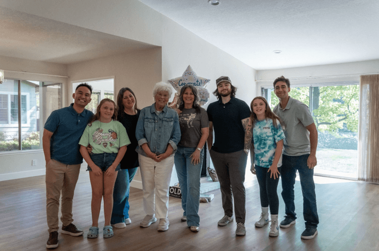 Three generations celebrating a new home