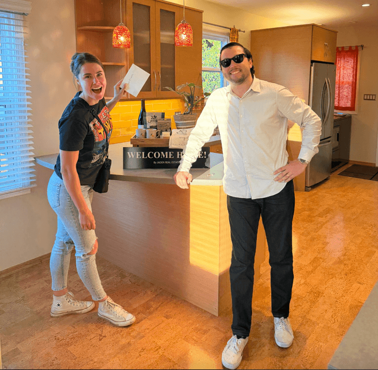 Jaden with a client in her new kitchen