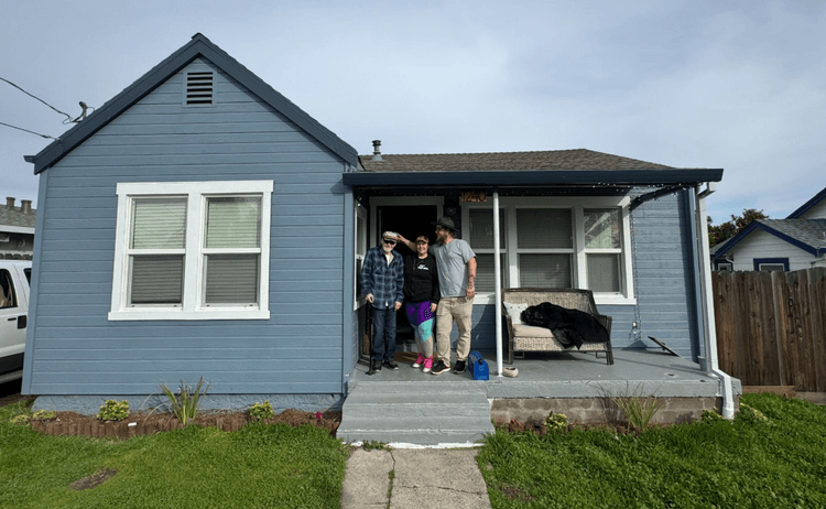 Sellers on the porch of their East Bay home